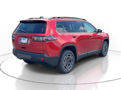 Red 2026 Jeep Cherokee Laredo