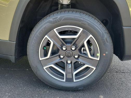 Green 2026 Jeep Cherokee Laredo