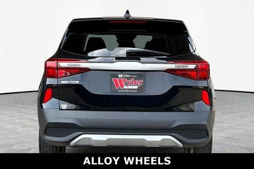 Cherry Black 2023 Kia Seltos LX