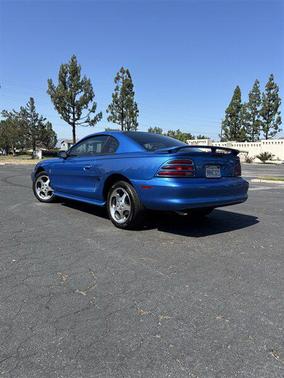 Bright Blue Clearcoat Metallic 1994 Ford Mustang Base