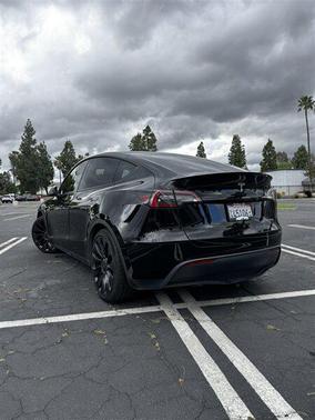 Solid Black 2023 Tesla Model Y Performance Dual Motor All-Wheel Drive