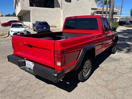 Red 1989 Jeep Comanche Base