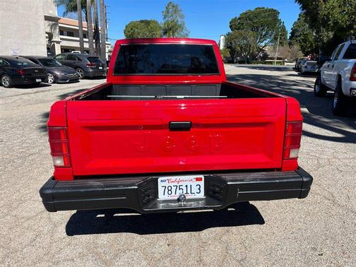 Red 1989 Jeep Comanche Base