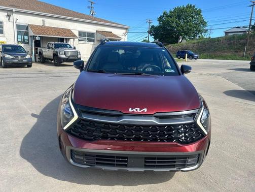 Dawning Red 2023 Kia Sportage S