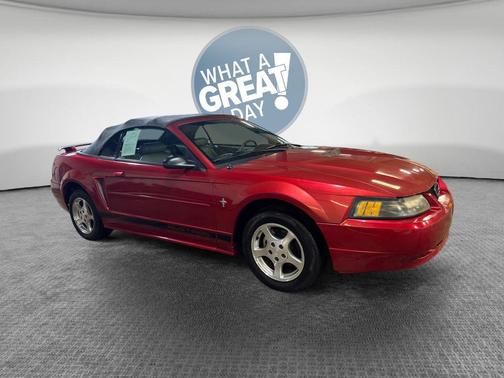 Laser Red Tinted Clearcoat 2002 Ford Mustang Deluxe