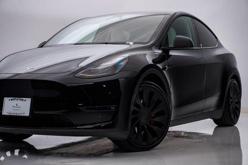 Solid Black 2023 Tesla Model Y Performance