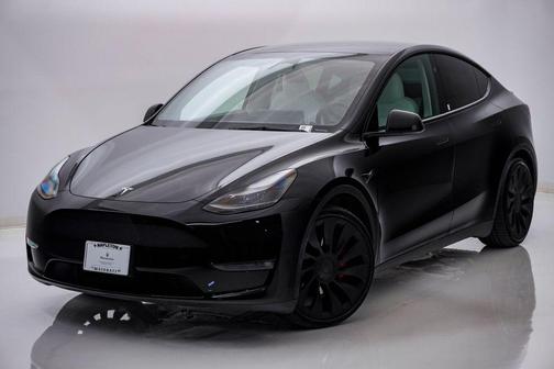 Solid Black 2023 Tesla Model Y Performance