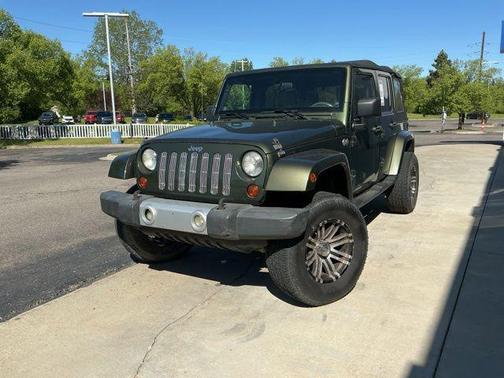 Jeep Green Metallic Clearcoat/Khaki Hard Top 2009 Jeep Wrangler Unlimited Sahara
