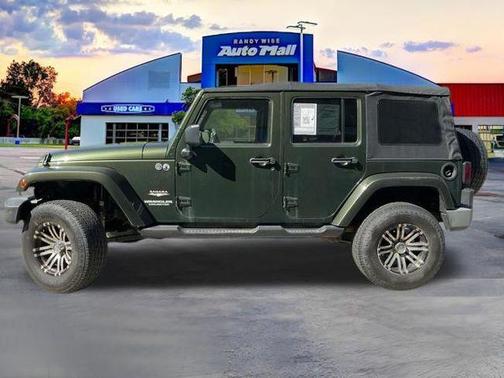 Jeep Green Metallic Clearcoat/Khaki Hard Top 2009 Jeep Wrangler Unlimited Sahara