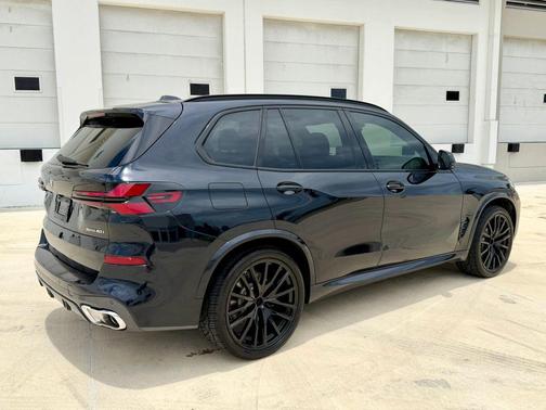 Blue 2024 BMW X5 sDrive40i