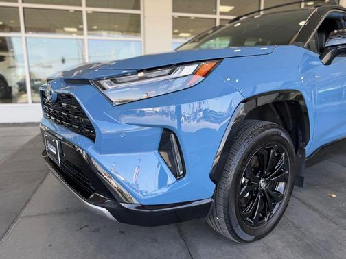 Cavalry Blue/Midnight Black Metallic 2024 Toyota RAV4 Hybrid SE