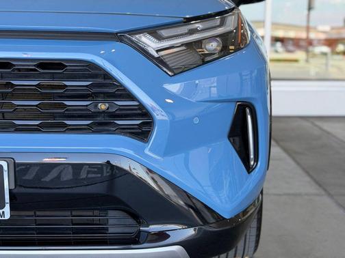 Cavalry Blue/Midnight Black Metallic 2024 Toyota RAV4 Hybrid SE