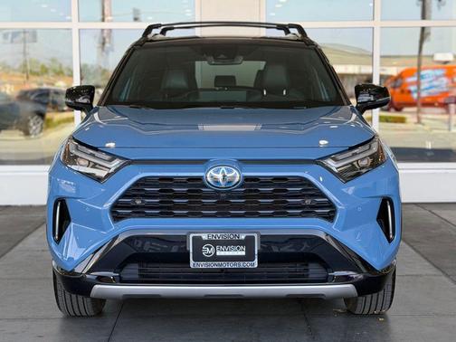 Cavalry Blue/Midnight Black Metallic 2024 Toyota RAV4 Hybrid SE