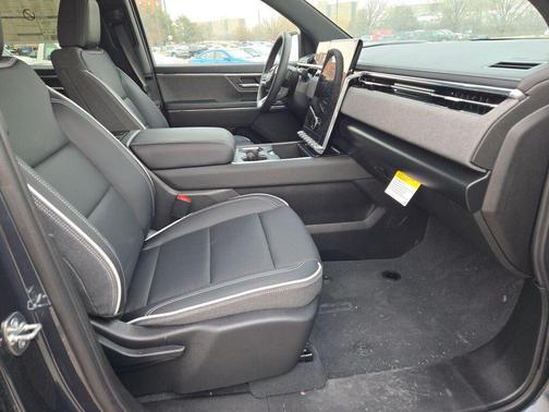 Deep Ocean Metallic 2026 GMC Sierra EV Extended Range Elevation