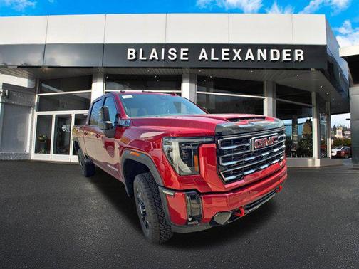 Volcanic Red Tintcoat 2026 GMC Sierra 3500 AT4