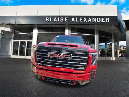Volcanic Red Tintcoat 2026 GMC Sierra 3500 AT4
