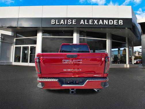 Volcanic Red Tintcoat 2026 GMC Sierra 3500 AT4