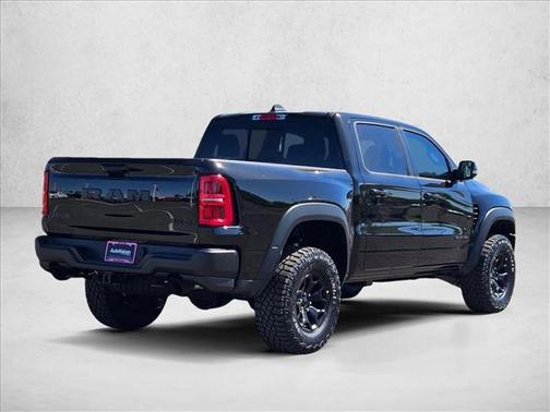 Diamond Black Crystal Pearlcoat 2026 RAM 1500 RHO Crew Cab 4x4 5'7' Box