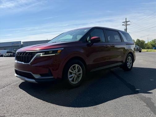 Red 2024 Kia Carnival LX