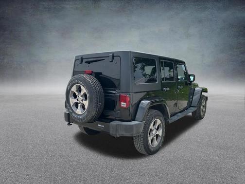 Black Clearcoat 2016 Jeep Wrangler Unlimited Sahara
