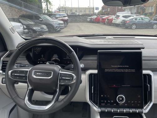 Volcanic Red Tintcoat 2025 GMC Acadia Denali