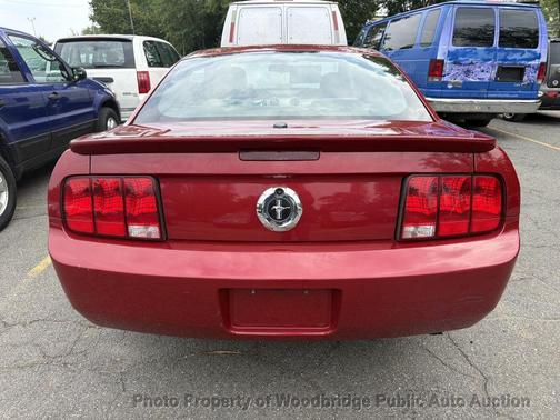 Red 2008 Ford Mustang Deluxe