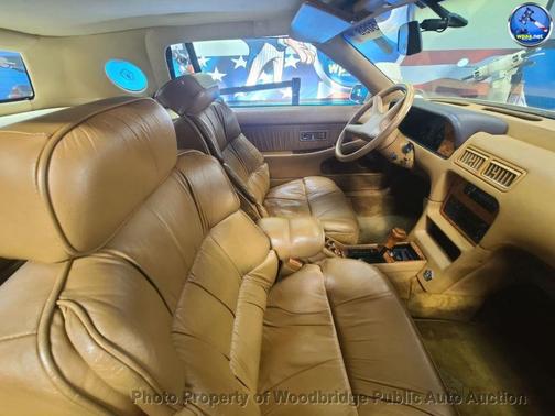 Yellow 1989 Chrysler TC by Maserati 2dr Coupe GTC