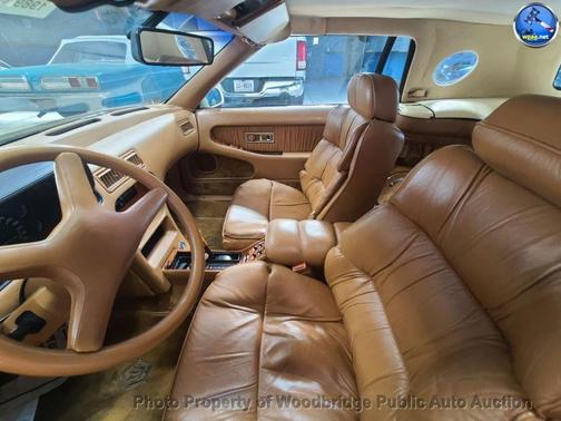 Yellow 1989 Chrysler TC by Maserati 2dr Coupe GTC