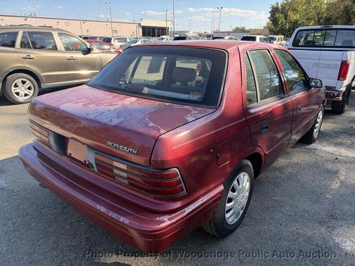 Maroon 1994 Plymouth Sundance 4dr