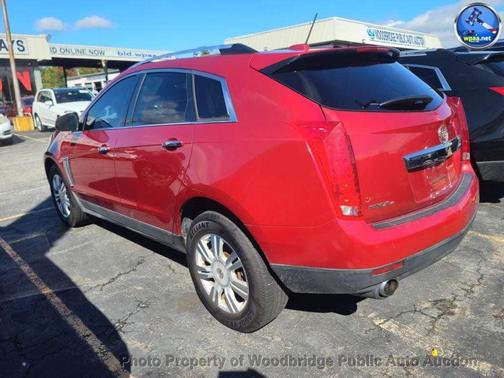 Crystal Red Tintcoat 2016 Cadillac SRX Luxury Collection