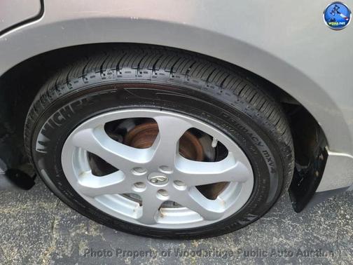 Tan 2004 INFINITI G35x Base