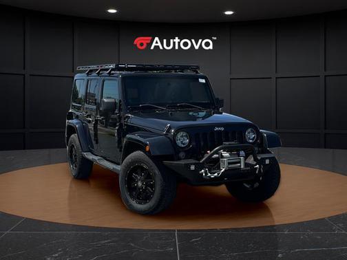 Black Clearcoat 2014 Jeep Wrangler Unlimited Sahara