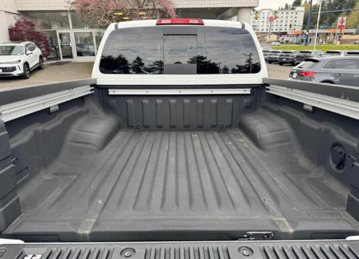 Glacier White 2024 Nissan Frontier SL