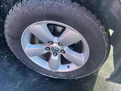 2014 RAM 1500 4WD Quad Cab Outdoorsman