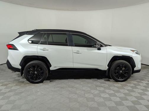 Wind Chill Pearl/Midnight Black Metallic 2024 Toyota RAV4 Hybrid SE