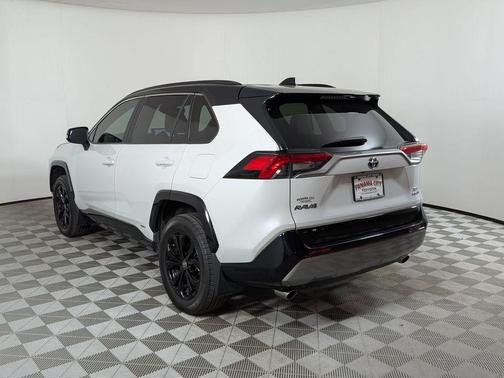 Wind Chill Pearl/Midnight Black Metallic 2024 Toyota RAV4 Hybrid SE
