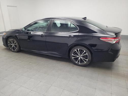 Midnight Black Metallic 2019 Toyota Camry Hybrid SE