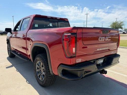 Volcanic Red 2025 GMC Sierra 1500 AT4X