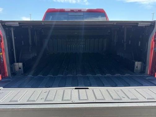 Volcanic Red 2025 GMC Sierra 1500 AT4X