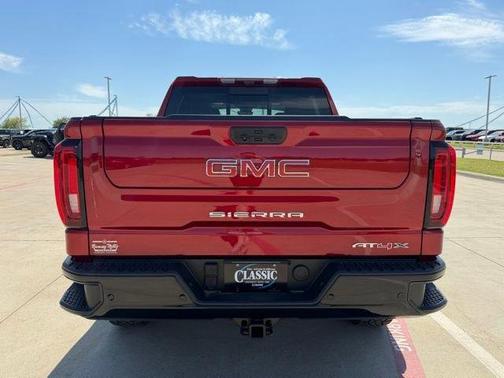 Volcanic Red 2025 GMC Sierra 1500 AT4X