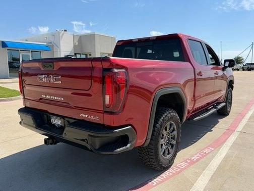 Volcanic Red 2025 GMC Sierra 1500 AT4X