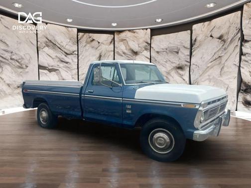 Blue 1976 Ford F-350 Super Camper