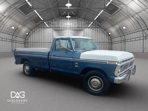 Blue 1976 Ford F-350 Super Camper