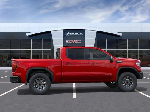 Volcanic Red Tintcoat 2026 GMC Sierra 1500 AT4X