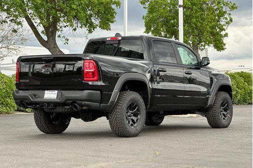 Diamond Black Crystal Pearlcoat 2026 RAM 1500 RHO Crew Cab 4x4 5'7' Box