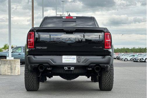 Diamond Black Crystal Pearlcoat 2026 RAM 1500 RHO Crew Cab 4x4 5'7' Box