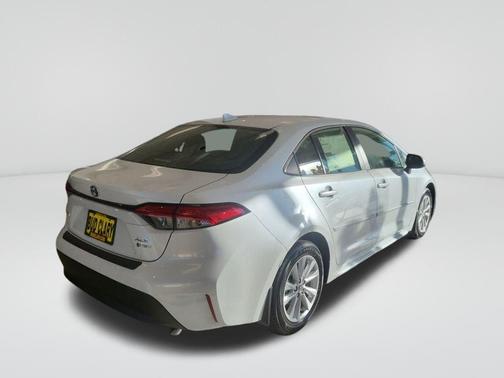 White 2025 Toyota Corolla Hybrid XLE