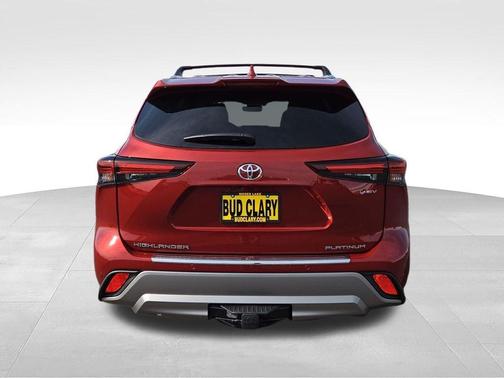 Red 2026 Toyota Highlander Hybrid Platinum