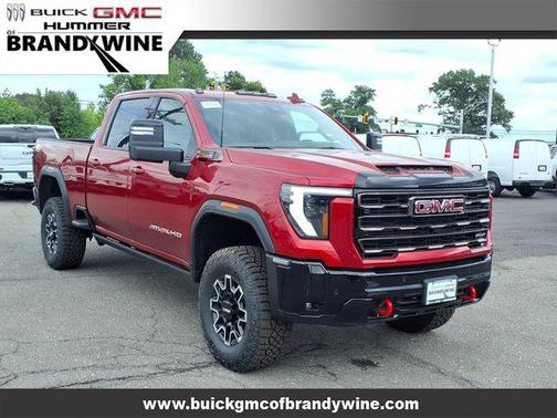 Volcanic Red Tintcoat 2026 GMC Sierra 2500 AT4X