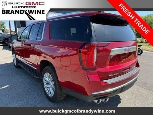 Volcanic Red Tintcoat 2024 GMC Yukon XL Denali